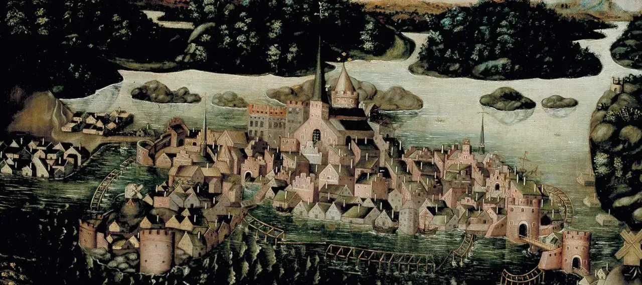 En historisk m&aring;lning som skildrar en stad vid vattnet med m&aring;nga hus, kyrkor och bef&auml;stningar. En vy som ger en inblick i stockholms historia.